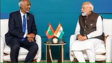 Maldives President Mohamed Muizzu (left) and Indian PM Narendra Modi