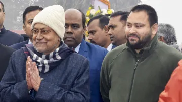 Nitish Kumar (left) with Tejashwi Yadav (right)