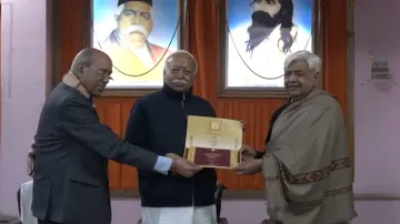 Ram temple construction committee chairperson Nripendra Misra and VHP working president Alok Kumar meet RSS chief Mohan Bhagwat in Delhi