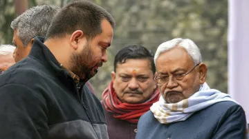 Chief Minister Nitish Kumar with Deputy Chief Minister Tejashwi Yadav during a programme in Patna.