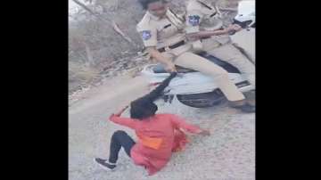 Telangana news, police drags girl by hair, WATCH video, Police drags girl student by hair in Hyderab