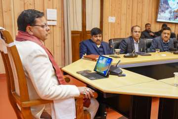 Uttarakhand Chief Minister Pushkar Singh Dhami during a meeting with officials regarding the recent violence that erupted in Haldwani