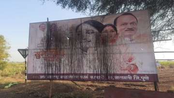 Maharashtra news, Ink thrown on poster declaring Ajit Pawar wife, ink hured on ajit pawar wife poste