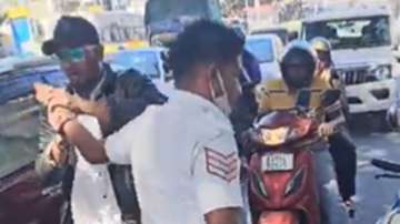 A two-wheeler rider, who was caught riding without helmet, bites a traffic police constable near Wilson Garden 10th Cross in Bengaluru.