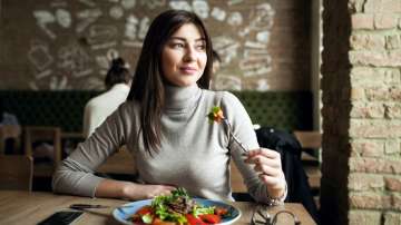 Woman eating protein breakfast