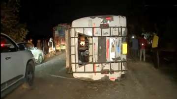The bus overturns after the accident