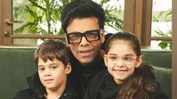 Karan Johar with his kids Yash and Roohi