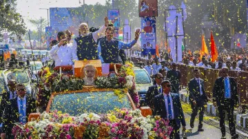 Prime Minister Narendra Modi with Maharashtra Chief Minister Eknath Shinde and Deputy Chief Minister Devendra Fadnavis during a roadshow, in Nashik. (File photo)