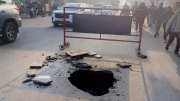 Road caves in Najafgarh near carriageway from Dhansa Stand towards Bahadurgarh Stand.