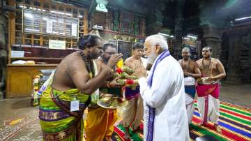 Prime Minister Narendra Modi offers prayers at Meenakshi Amman Temple in Madurai.
