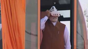 PM Modi uses virtual reality headset to inspect Kashi Ropeway project in Varanasi.