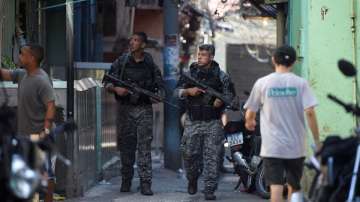 Rio police occupy favelas in new push to combat gangs