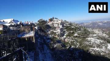Shimla covered in a blanket of thick snow, as the area receives heavy snowfall.