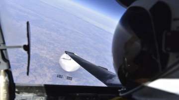 A US Air Force U-2 pilot looks down at a suspected Chinese surveillance balloon as it hovers over th