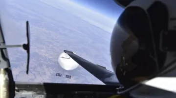 A US Air Force U-2 pilot looks down at a suspected Chinese surveillance balloon as it hovers over th