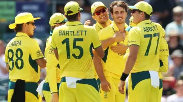 Lance Morris celebrates a wicket with his teammates.