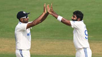 R Ashwin celebrates a wicket with Jasprit Bumrah.