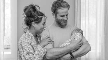 Kane Williamson with his newly-born and wife.