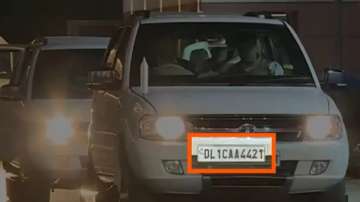 Amit Shah's car seen with 'CAA' mention on its number plate.