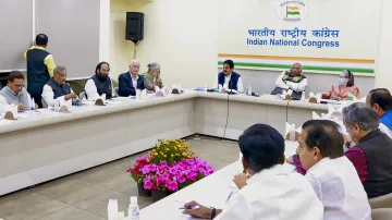 Congress President Mallikarjun Kharge with party leaders Sonia Gandhi, KC Venugopal and others during the Congress Central Election Committee (CEC) meeting for the upcoming Lok Sabha polls, at AICC Headquarters in New Delhi.