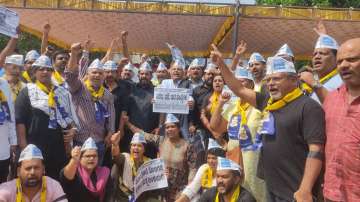 AAP Karnataka unit leaders hold protest following arrest of national convenor Arvind Kejriwal.