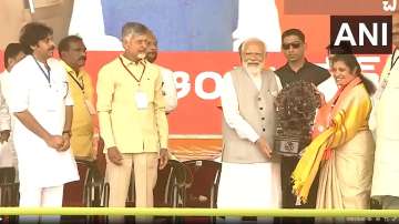 PM Modi with Chandrababu Naidu and Pawan Kalyan at poll rally in Andhra Pradesh