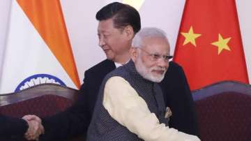 Prime Minister Narendra Modi with Chinese President Xi Jinping in Goa during BRICS Summit in 2016.