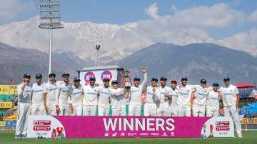 Indian team with trophy.