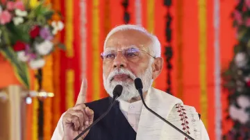 Prime Minister Narendra Modi addresses at the foundation stone laying and inauguration of multiple developmental projects, in Sindri, Dhanbad district in Jharkhand.