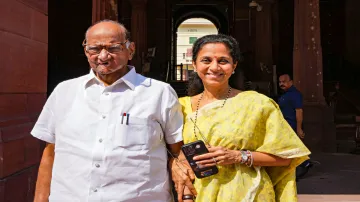 NCP leader Supriya Sule with Sharad Pawar.