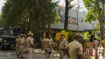 Security personnel stand guard at the Rameshwaram cafe blast site, in Bengaluru.