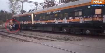 Railway workers push coach after it breaks down in Uttar Pradesh's Amethi