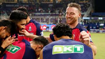 Jos Buttler surrounded by his teammates after pulling off a crackerjack of a chase for Rajasthan Royals, having hit his 7th century in the IPL