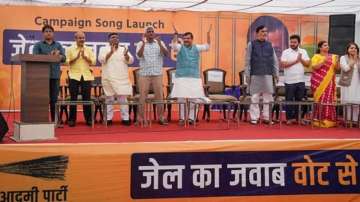 AAP leaders Sanjay Singh and Gopal Rai with others at the party's campaign song launch ahead of Lok Sabha polls