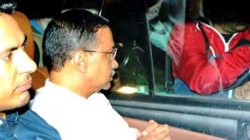 Delhi Chief Minister Arvind Kejriwal with Enforcement Directorate officials.
