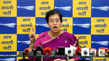 Delhi Minister and AAP leader Atishi addresses at press conference at the party office, in New Delhi.