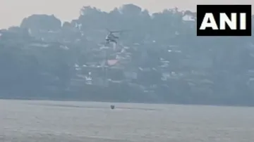 IAF Chopper takes water from Bhimtal Lake in Nainital.