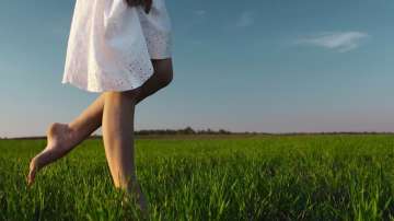 walking barefoot on grass