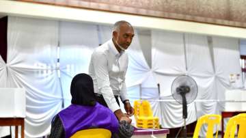 Maldives President Mohamed Muizzu while casting vote