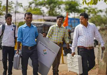 Polling officials with EVMs and other election material leave for election duty ahead of Lok Sabha elections in Bastar