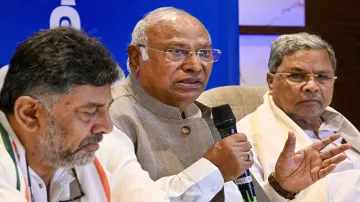 Congress President Mallikarjun with Karnataka Chief Minister Siddaramaiah and Deputy Chief Minister DK Shivakumar.