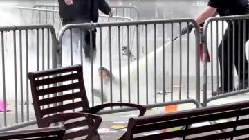 A person covered in flames outside the courthouse where former U.S. President Donald Trump's criminal hush money trial was underway.