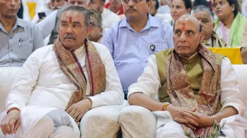 BJP leader Vijay Sampla with Defence Minister Rajnath Singh.