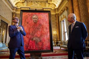 Artist Jonathan Yeo, left, and Britain's King Charles III at the unveiling of Yeo's portrait of the King