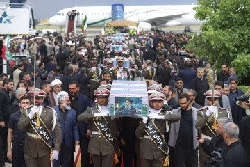 Iranian soldiers carrying the coffin of Iranian President Ebrahim Raisi