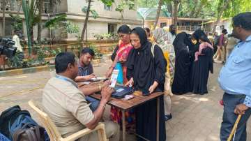 Women queuing up outside Bengaluru post offices 