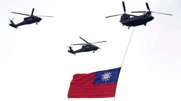 Helicopters fly over with Taiwan national flag during an inauguration celebration of Taiwan's Presid