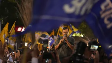 Delhi Chief Minister Arvind Kejriwal addresses supporters outside Tihar Jail after the Supreme Court (SC) granted him interim bail in a money laundering case, amid the ongoing Lok Sabha elections, in New Delhi.