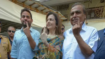 Mukesh Ambani, Tina Ambani with son Akash