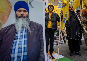 Protesters chant outside of the Consulate General of India office during a protest for the recent shooting of Shaheed Bhai Hardeep Singh Nijjar in Vancouver, British Columbia.